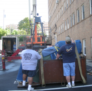Kansas City Movers deliver a piano with a crane!
